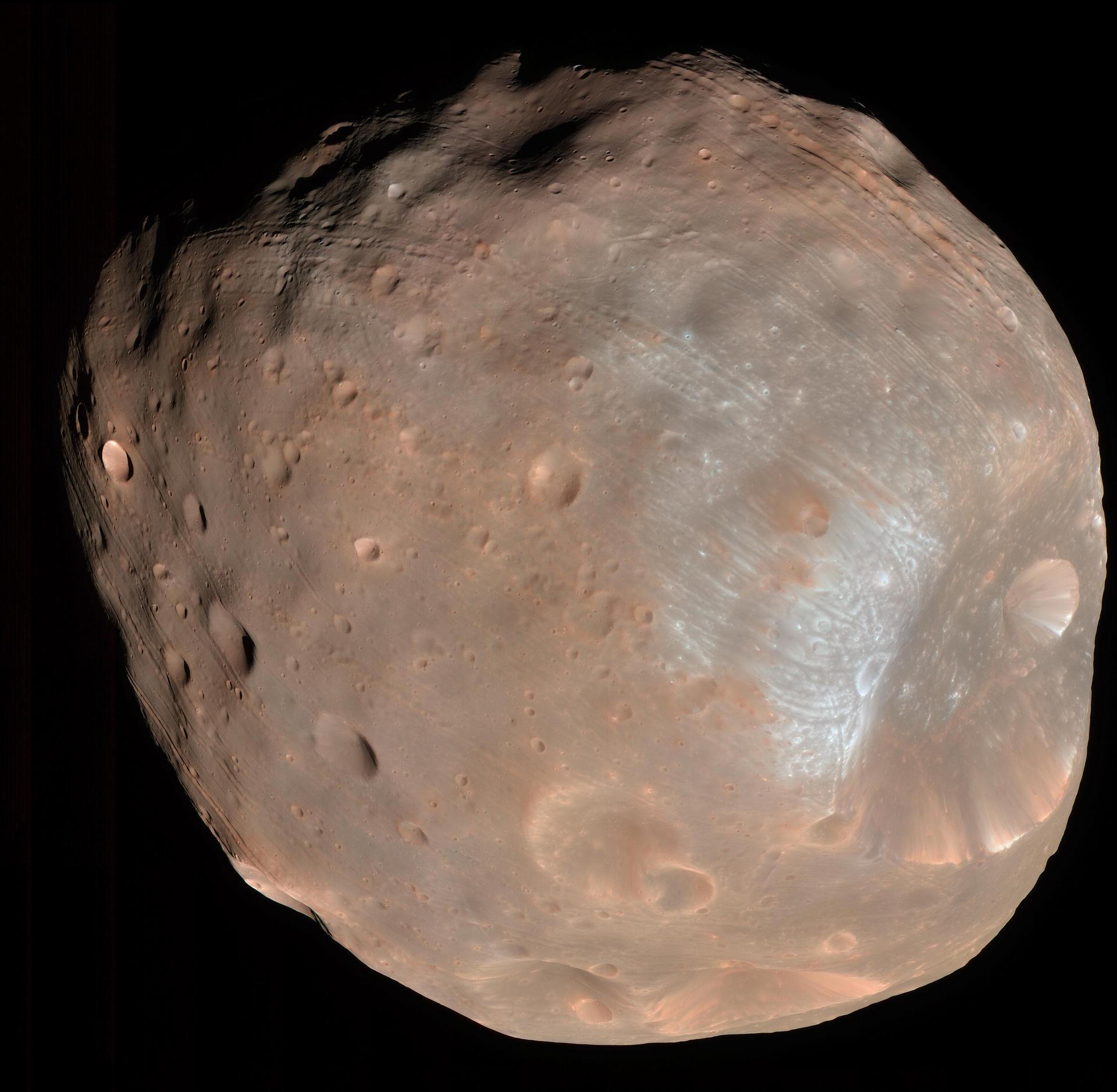 Phobos, the larger irregular moon of Mars, heavily cratered.