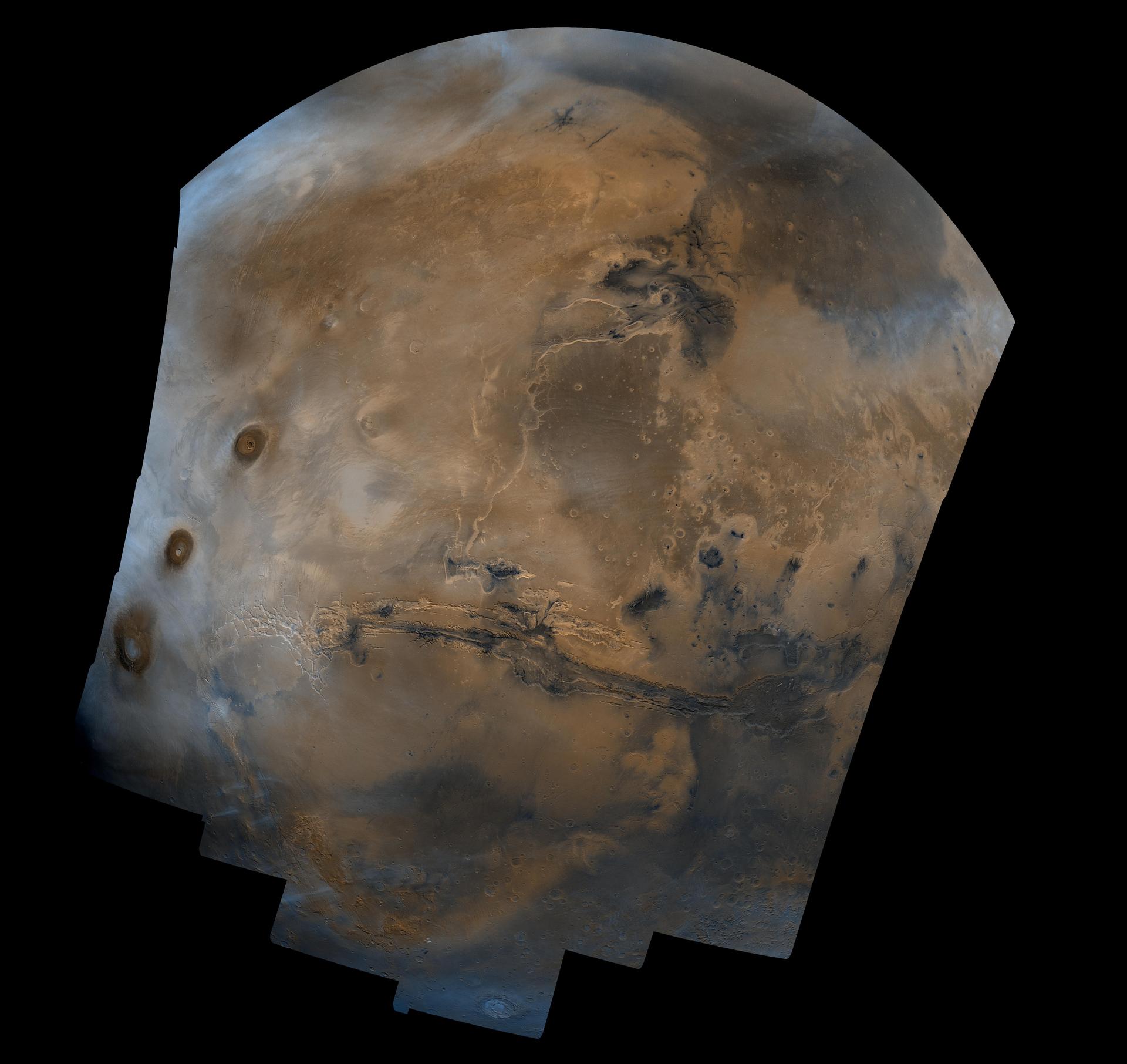 Valles Marineris crossing a hemisphere of Mars, Tharsis volcanoes at left. Viking mosaic.